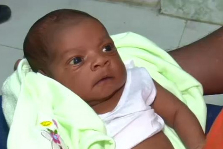 The baby was crying inside the carton, the police came and took him to the police station