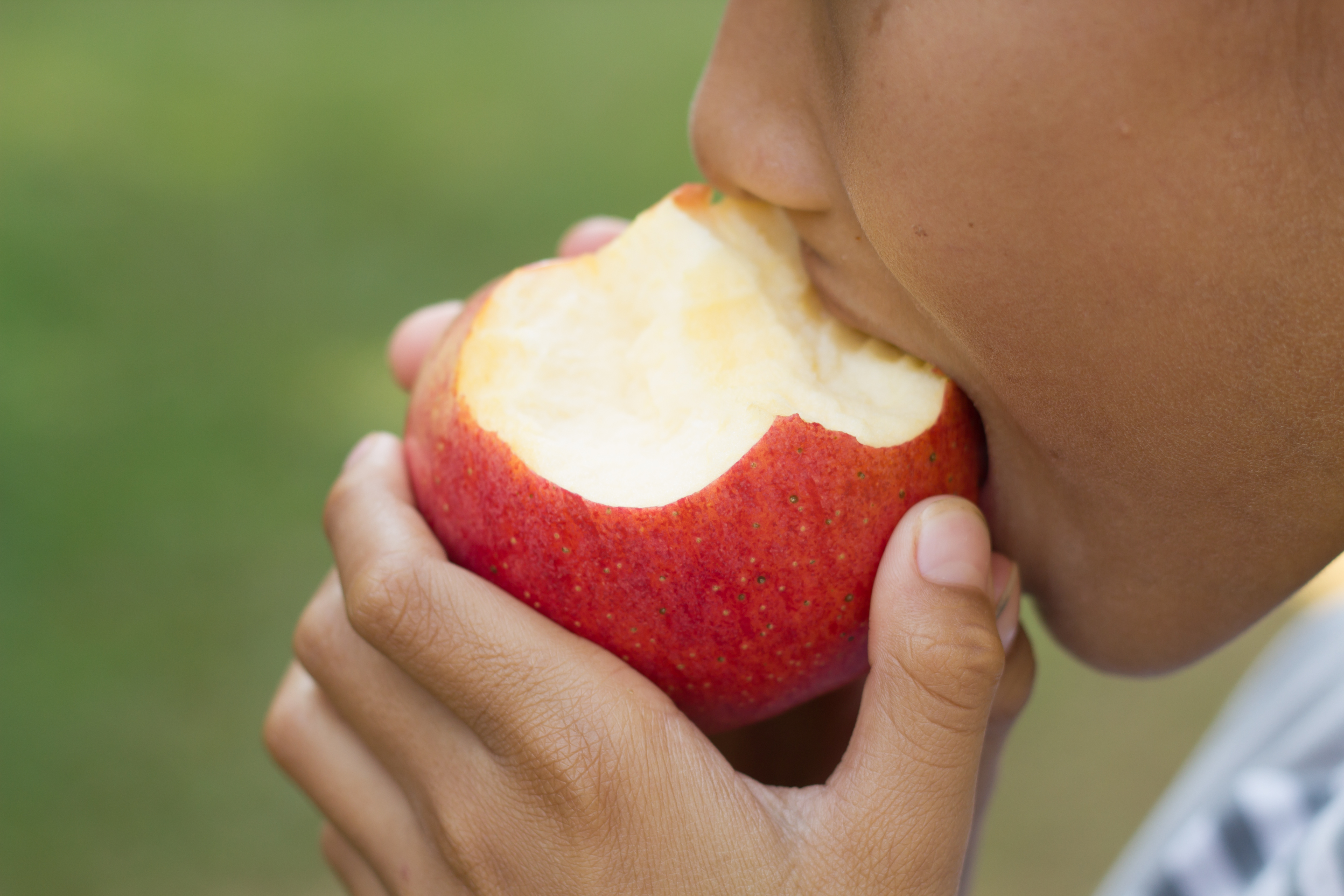little-asian-boy-enjoy-eat-apple